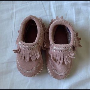 Light pink Minnetonka baby shoes